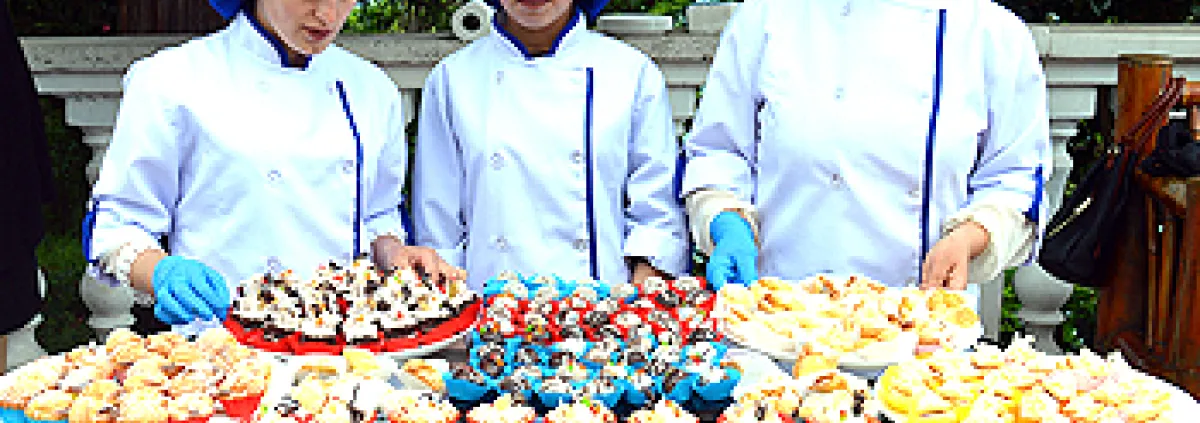Students showing what they cooked