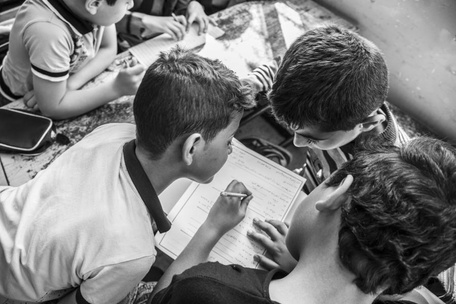 Boys studying together